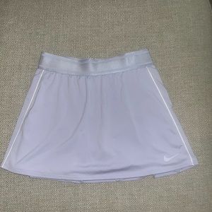 Nike skirt with built in shorts, purple, good condition! Size Extra Small